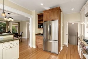 The kitchen with a stainless steel refrigerator
