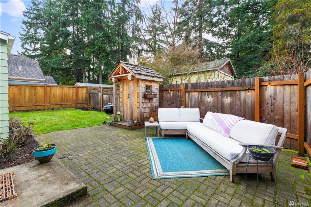 Back yard and patio of the craftsman Broadview home