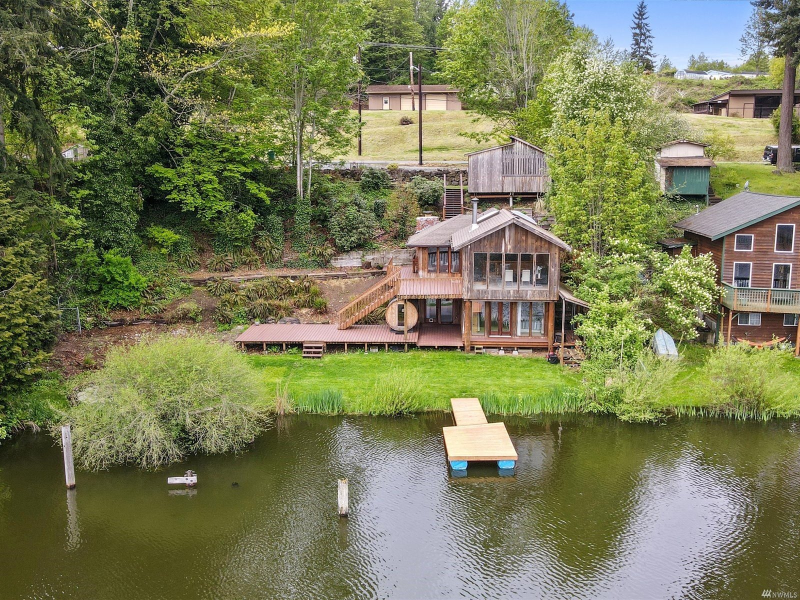 An aerial view of the Martha Lake home from the lake