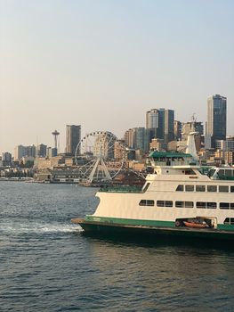 Ferry-and-Downtown-Seattle-Elliot-Bay-by-Abner-campos