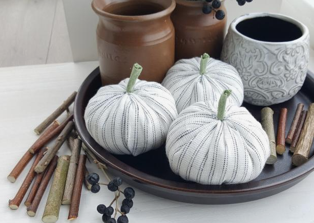 white fabric pumpkins