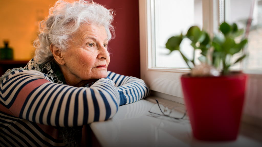 Helping a Parent Sell Their Home - Senior looking reflective
