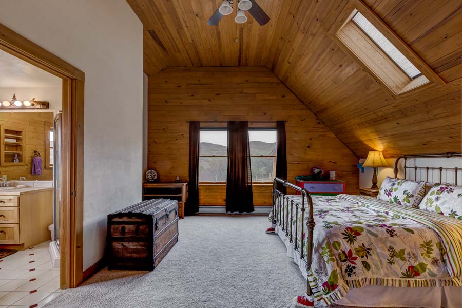 Master bedroom at 31350 Deerwood Ranch Rd, Oak Creek, CO 80467