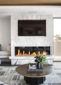 Modern fireplace with marble surround