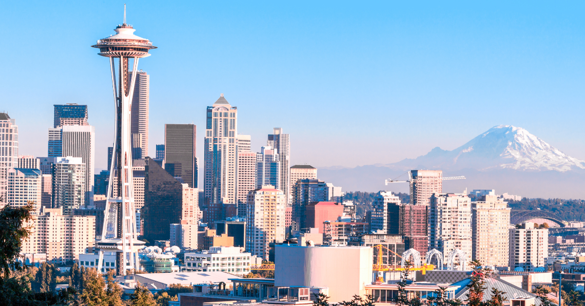 Aerial view of downtown Seattle skyline and Space Needle at sunset — Seattle real estate market 2025