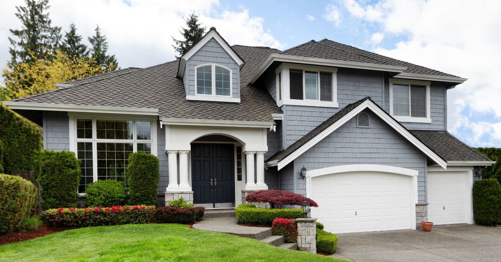 Seattle craftsman homes with for-sale signs showing strong housing demand