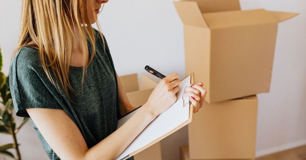 Buyer reviewing relocation plans or moving checklist