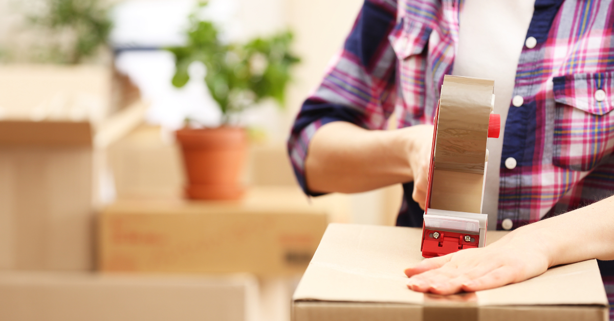 A homeowner packing boxes