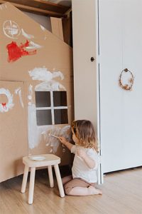 A child working on their home renovation project.