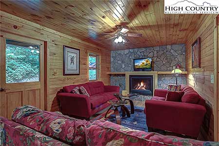 Living room with fireplace in 175 Payton Lane home in Banner Elk, NC