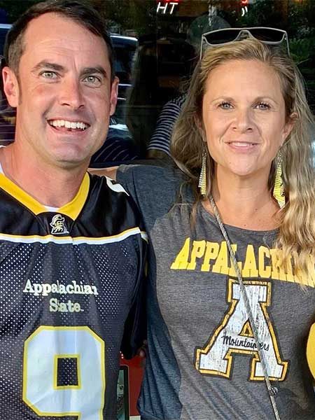 Sarah Long, real estate agent in Boone, enjoying a App State football tailgate.
