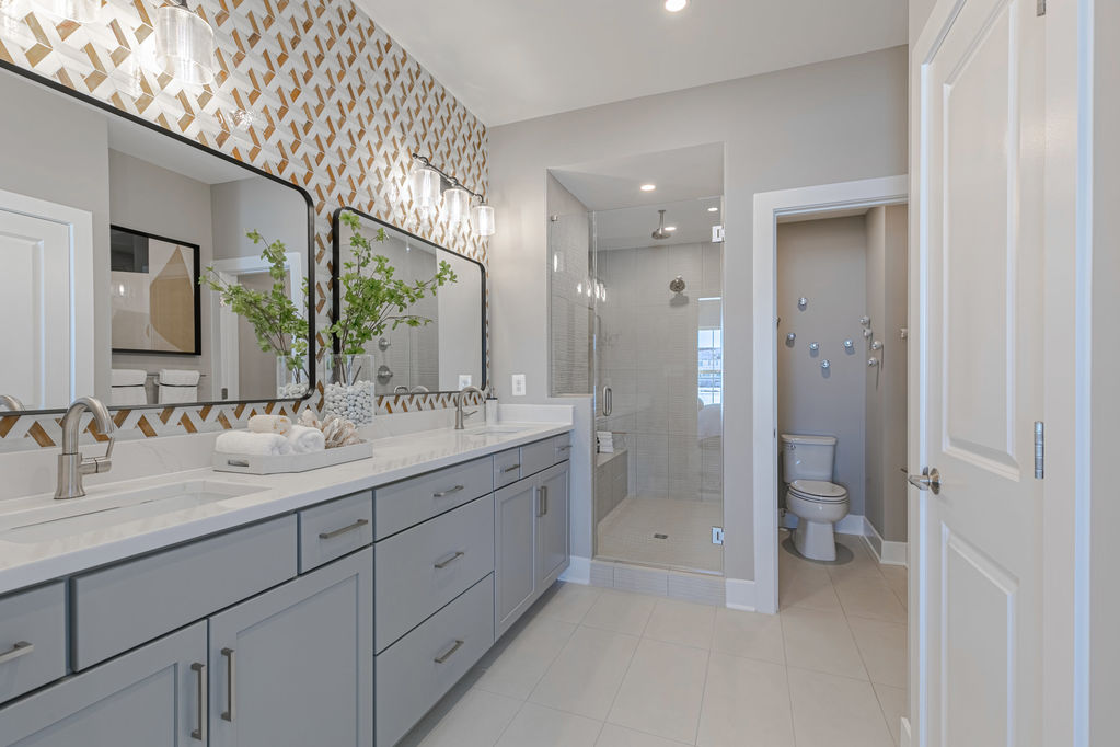 The Primary Bathroom in the Fairland Model at Vantage Hill Townhomes in Reston