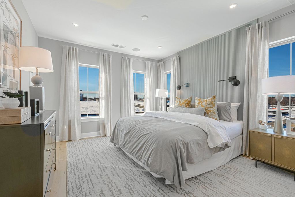 The Primary Bedroom in the Fairland Model at Vantage Hill Townhomes in Reston