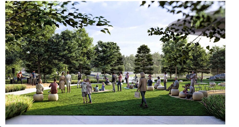 Rendering of Heafield Green at Halley Rise in Reston, showing people on a lawn watching a band perform on a small stage with a pond visible behind the trees.
