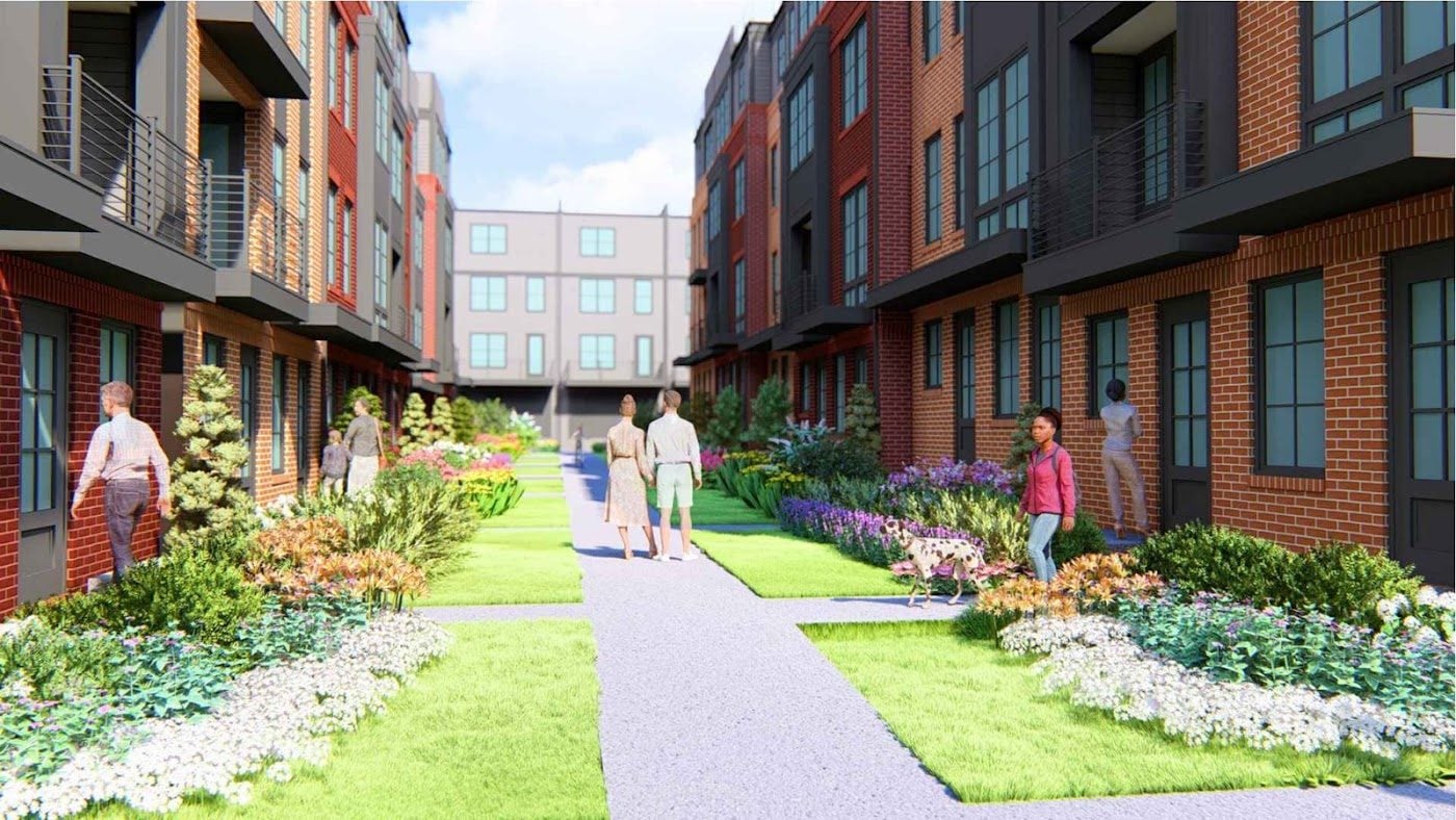Rendering of a green mews with front yards between rows of townhomes on Block W2 at Isaac Newton Square in Reston, VA