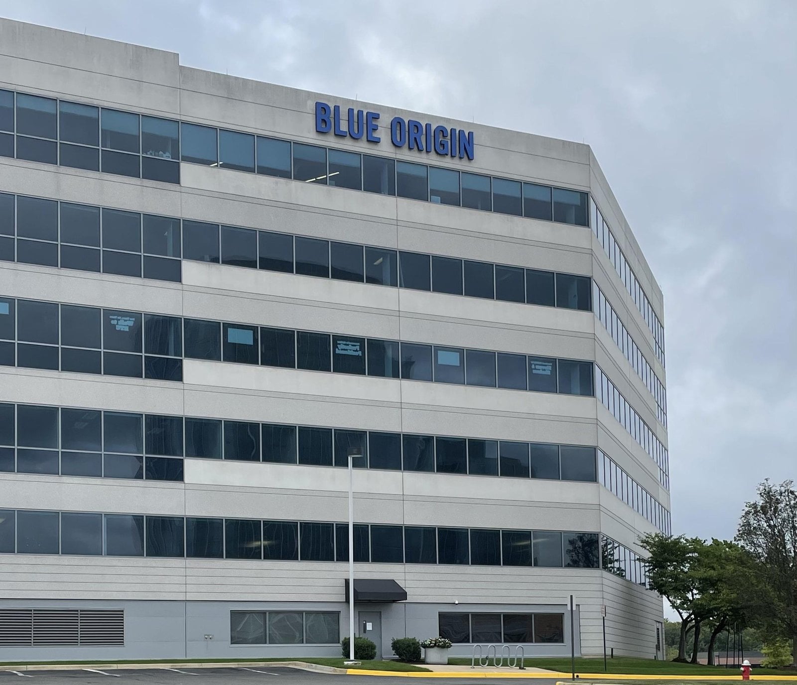 Blue Origin sign on the office building at 2001 Edmund Halley Drive in Reston, Virginia