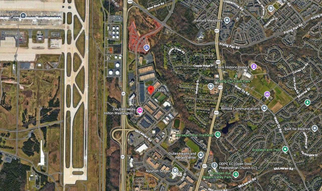 Satellite map showing the industrial pocket east of Route 28 in Herndon with the 13860 Redskin Drive data center site pinned, near Frying Pan Road and McLearen Road