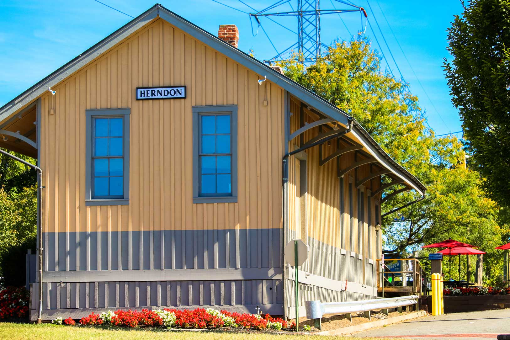 The yellow 1857 Herndon Depot beside the W&OD Trail in downtown Herndon, Virginia
