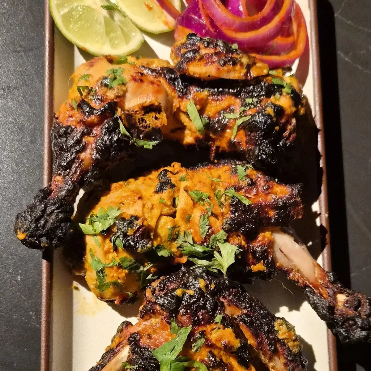 Tandoori chicken with lime and pickled onion at NH44 Indian Brewing Co. in Arrowbrook Centre, Herndon