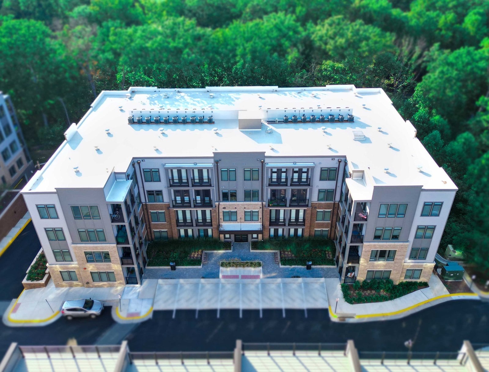 The Flats at Tall Oaks condominium building on Bandit Loop in Reston, seen from above