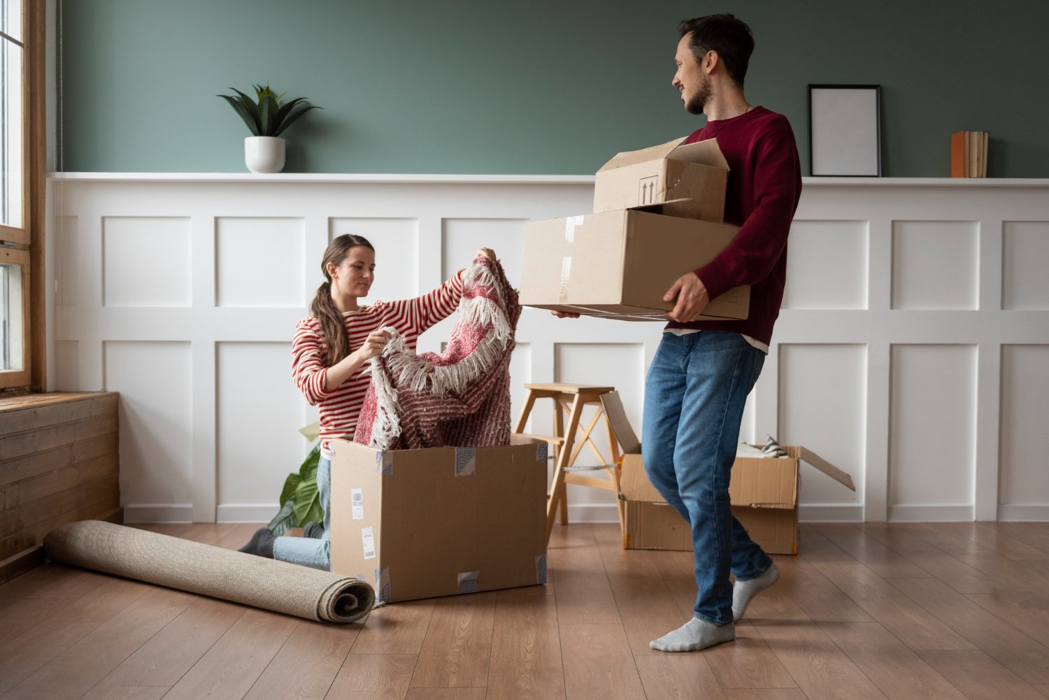 young-couple-moving-into-new-home