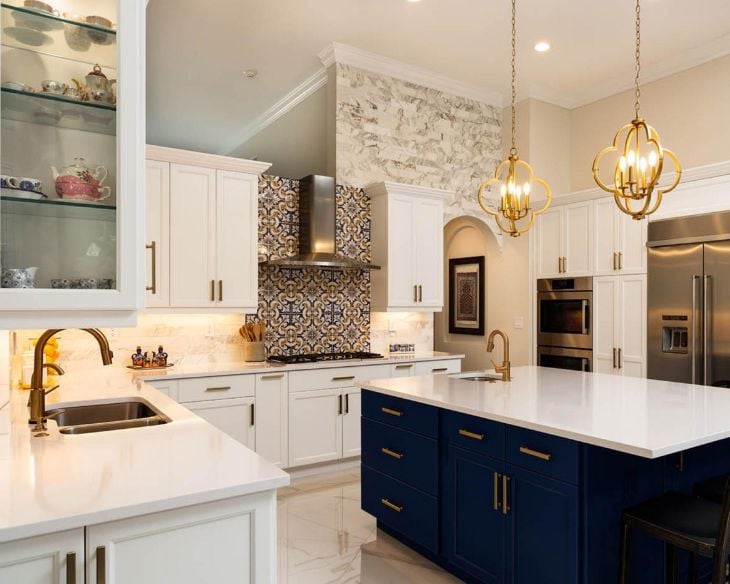 Kitchen during renovation showing side-by-side before and after stages of remodeling