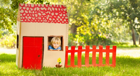 Kid playing in a small house