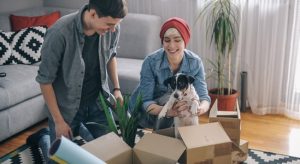 Young couple moving in with there dog
