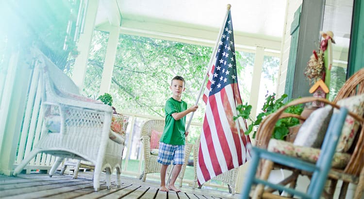 Kid holding USA flag