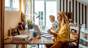 Young mother working from home