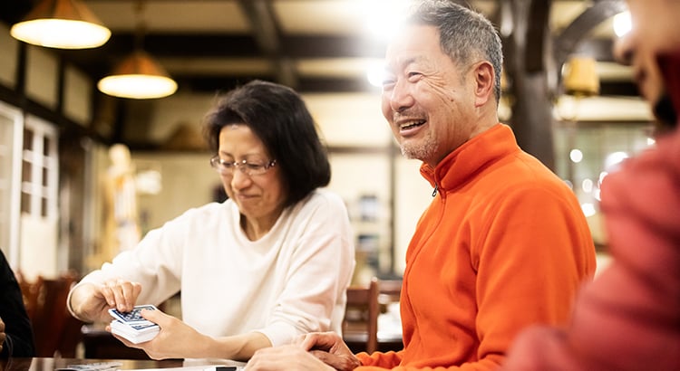 Senior asian couple laughing together