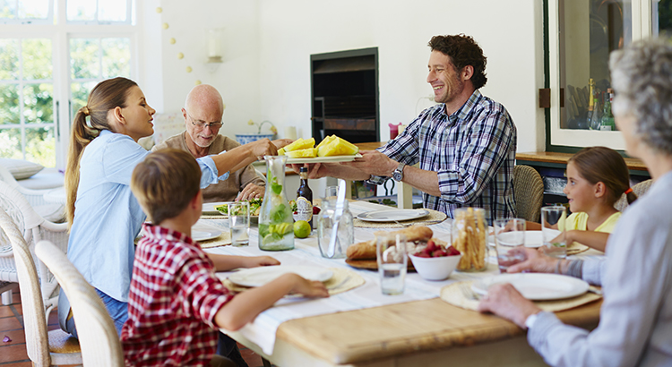 Family having meal at dining table