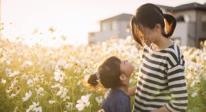 Mother and daughter in a garden