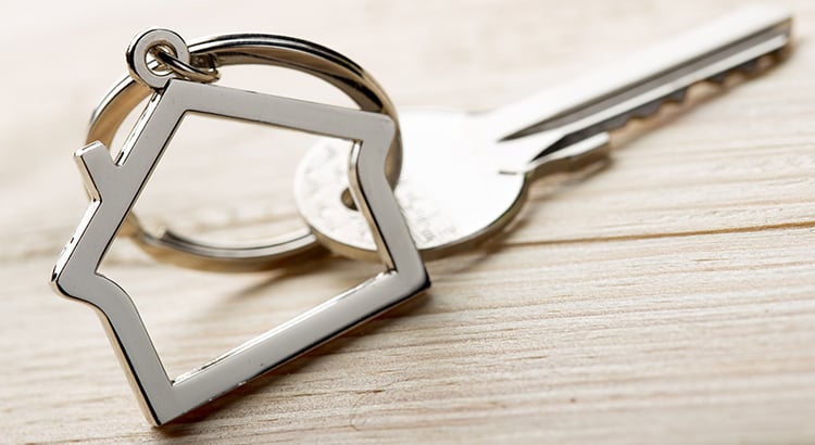 Key with a house keychain
