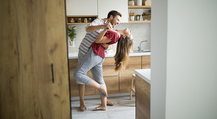 Couple dancing in the kitchen