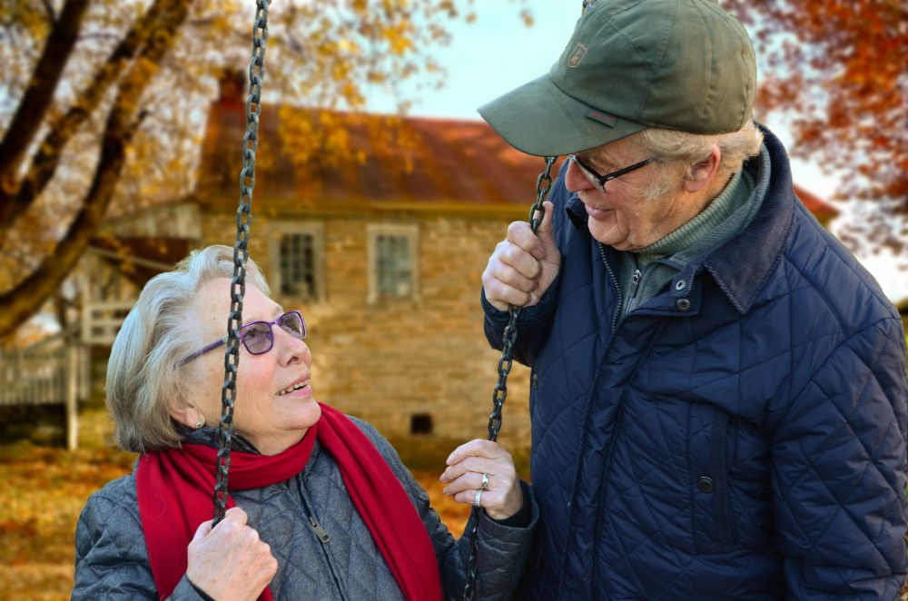couple enjoy retirement outdoors near Dallas home