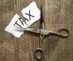 Scissors cutting taxes Homestead exemption cuts property taxes