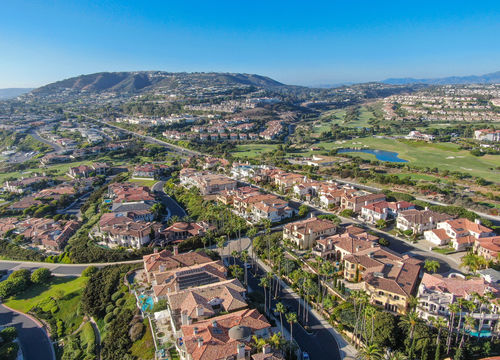 Aerial,View,Of,Monarch,Beach,Coastline.,Small,Neighborhood,In,Orange