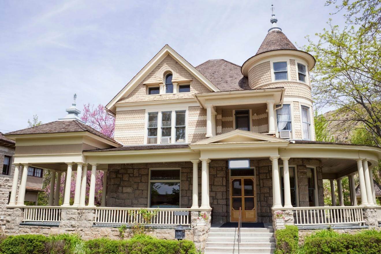The tower house Queen Anne home is one of the most recognizable. These normally feature a prominent tower with a front-facing gable next to it and a wraparound porch. Some are up to three or four stories and have a dramatic appearance with their tall, narrow lines and sharp gables.