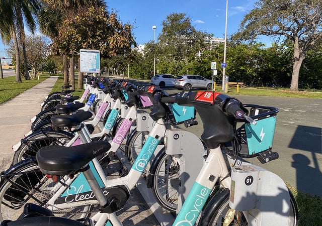Scooter Bikes for Rent lined on Street