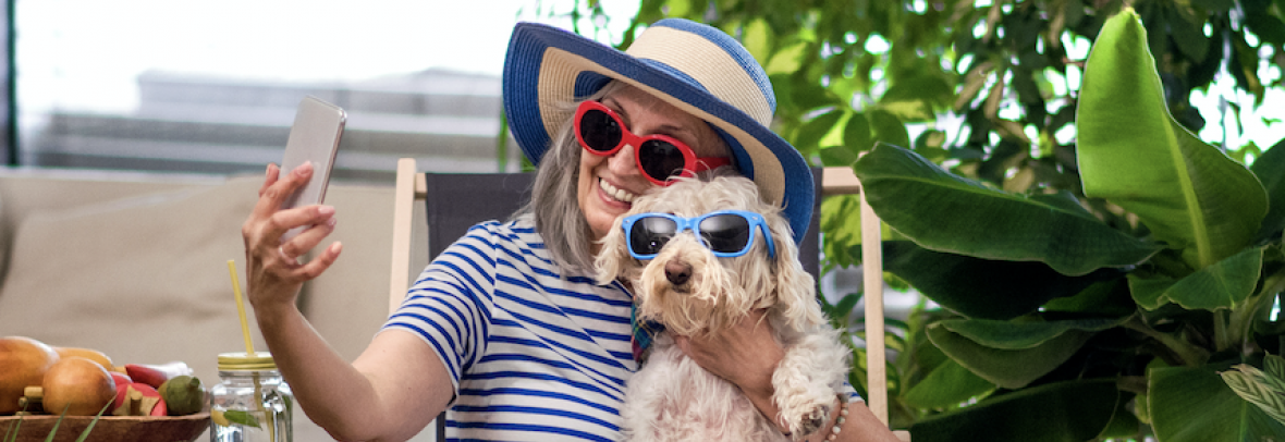 Woman & Pet Both Wearing Sunglasses Taking Selfy