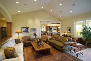 Nice spacious livingroom with walk through to very large kitchen, modern home, artwork on walls replaced with my own stock photos