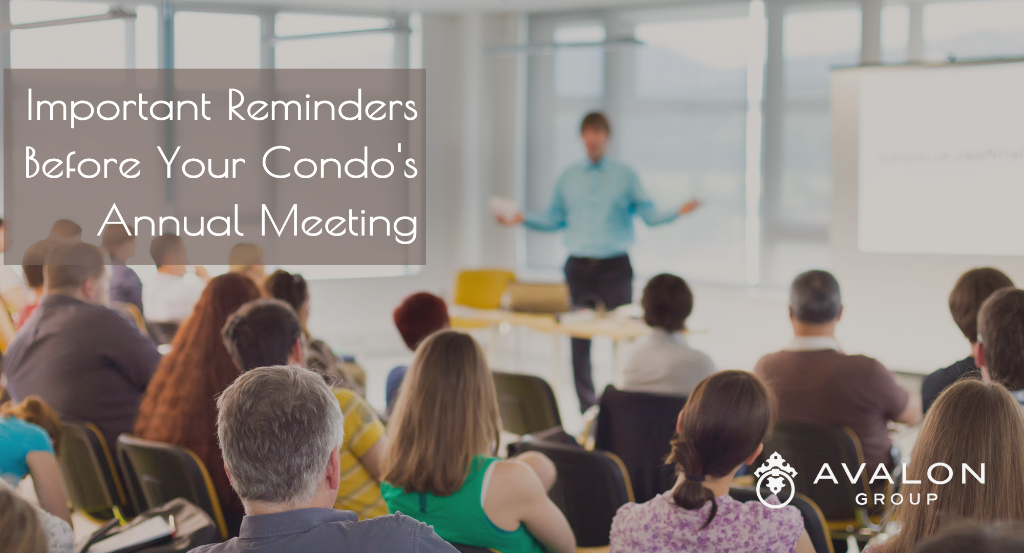 Important Reminders Before Your Condo's Annual Meeting. The picture shows a condo meeting with a speaker in the front of the room wearing a teal shirt.
