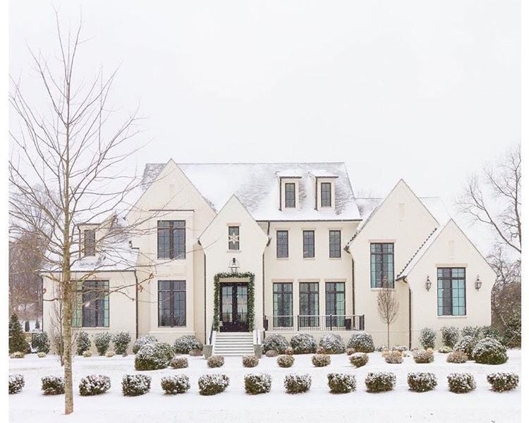 SW Shojii White Home Exterior with Snow in the yard. The color of the house is a white/beige.
