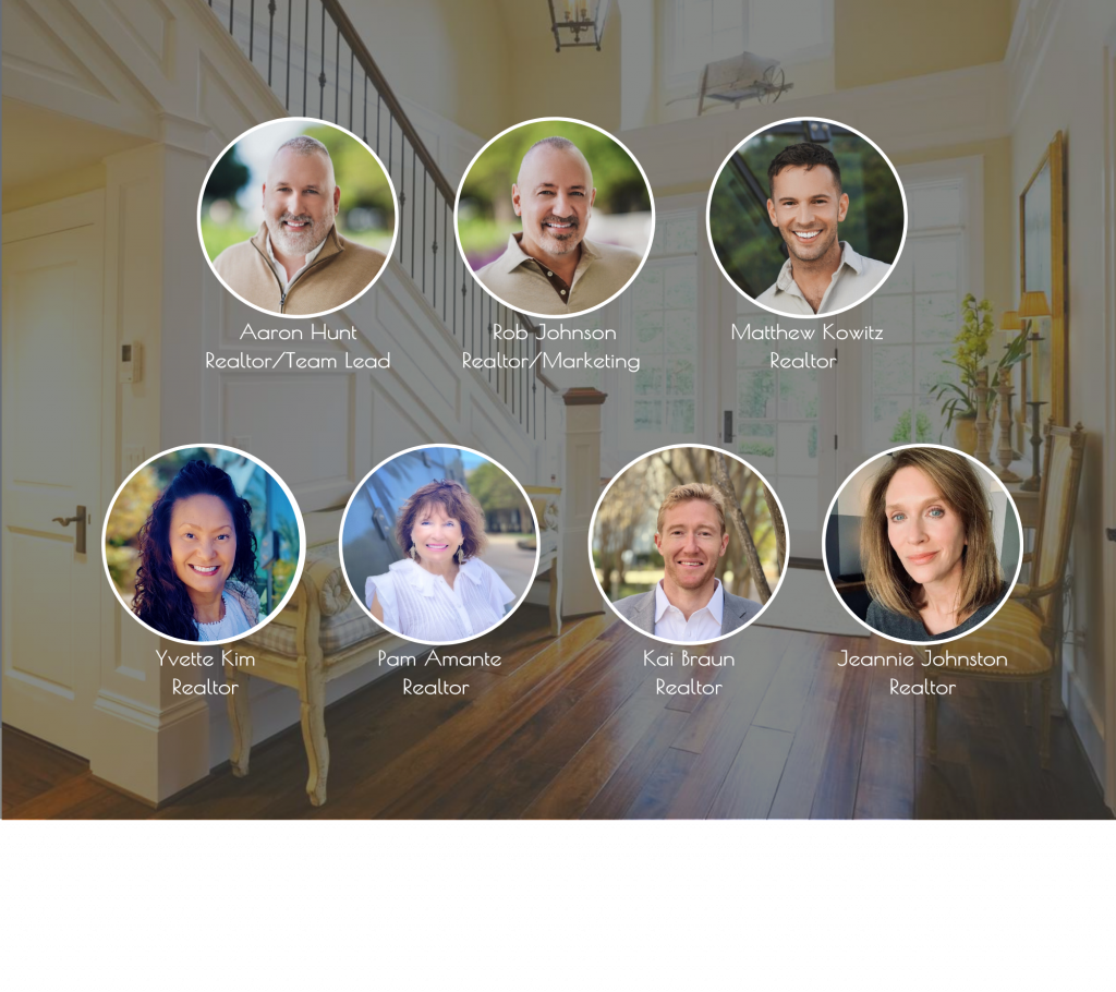 This picture has a background of a foyer with white staircase to the left. On top of the picture are the pictures of the 7 Realtors on the Avalon Group Team.