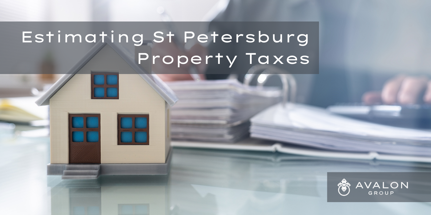St Petersburg Property Taxes Cover picture with a miniature home on a desk. A person is using a calculator to estimate taxes.