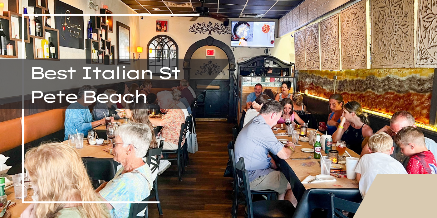 Best Italian St Pete Beach cover picture shows a full restaurant with Italian food on the table.