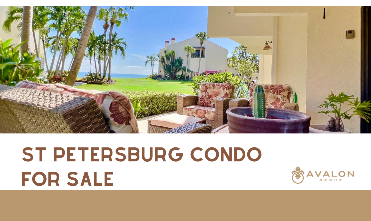 St Petersburg Condo For Sale cover picture shows a condo patio with Tampa Bay water in the background with green grass and palm trees.