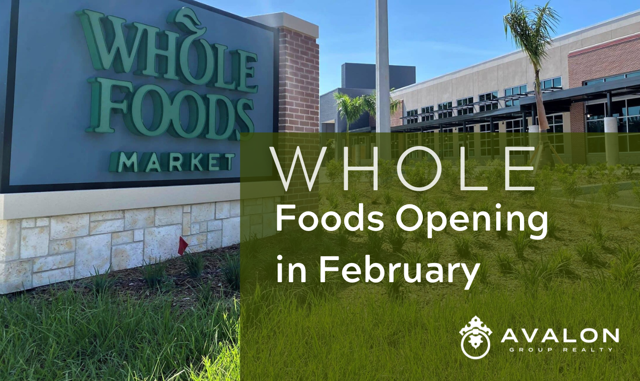 Whole Foods Opening in February cover picture shows the store sign in front of the new building.