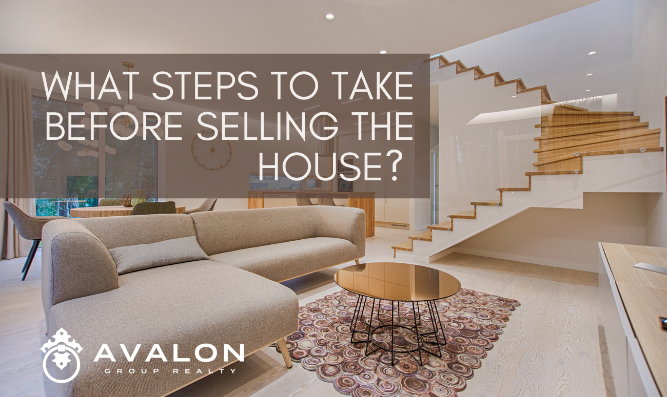 What Steps to Take Before Selling the House cover picture shows a living room that is browns and beiges with a modern light oak wooden staircase.